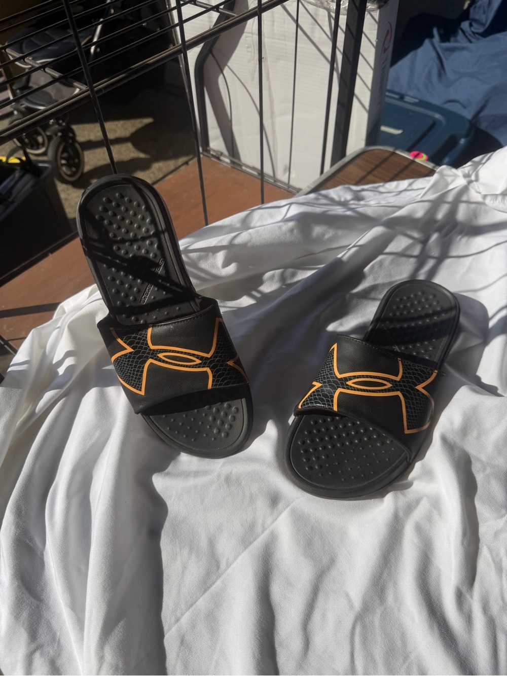Under Armour Black Slide Sandals with Orange Logo